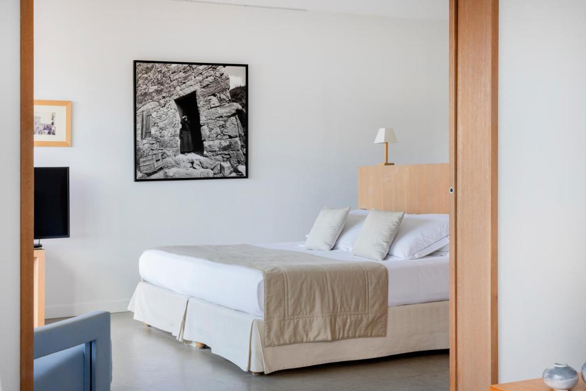 Un ou plusieurs lits dans un hébergement de l'établissement Casadelmar