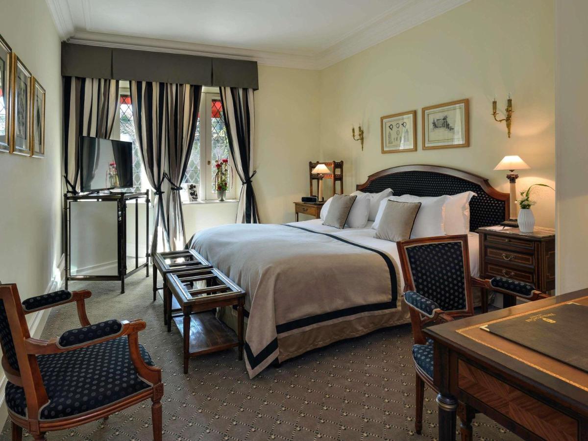 Un ou plusieurs lits dans un hébergement de l'établissement Hotel de la Cité Carcassonne - MGallery Collection