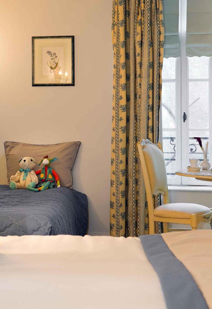 Un ou plusieurs lits dans un hébergement de l'établissement Hotel de la Cité Carcassonne - MGallery Collection