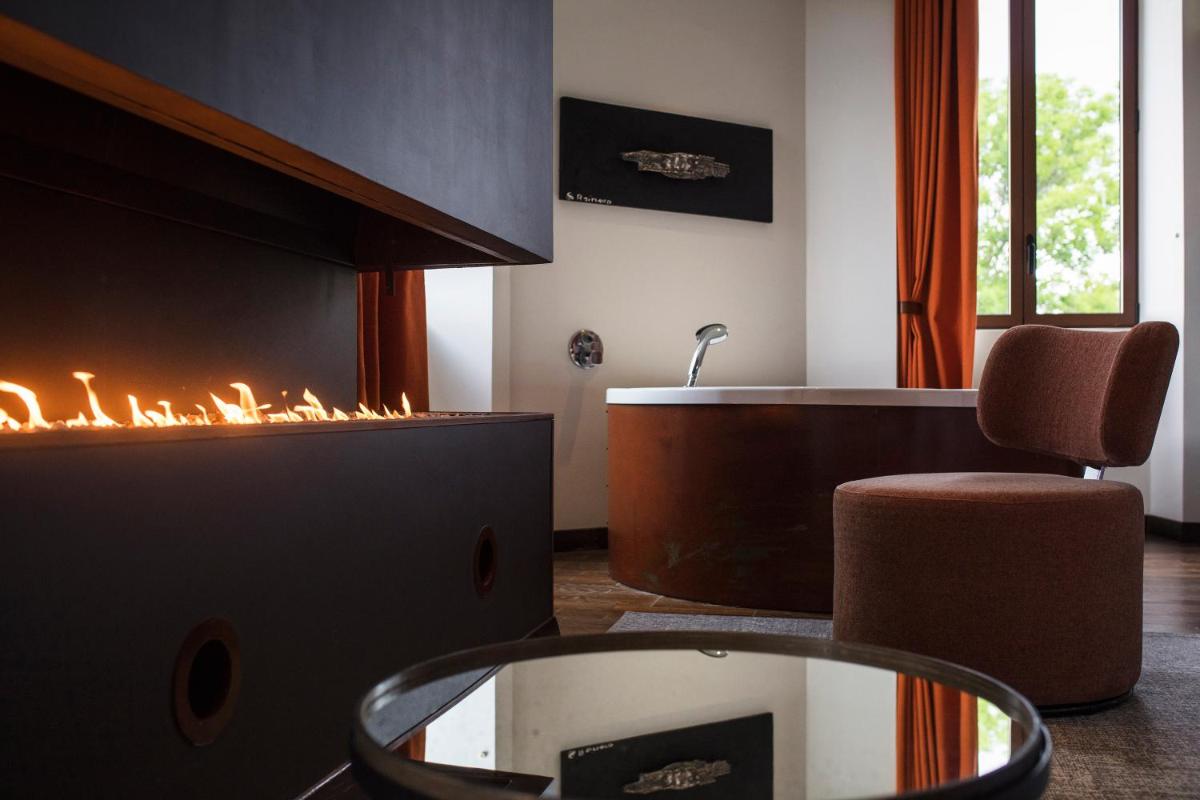 Coin salon dans l'établissement Le Clos Des Sens