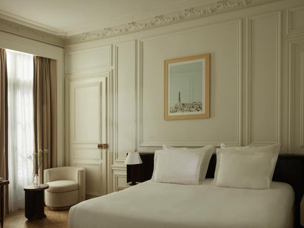 Un ou plusieurs lits dans un hébergement de l'établissement Maison Delano Paris