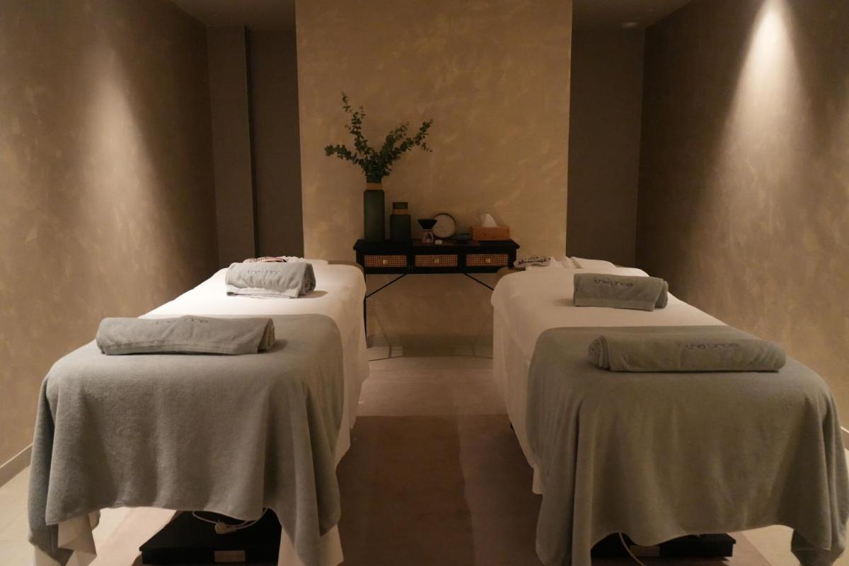 Uma cama ou camas num quarto em The Lince Braga