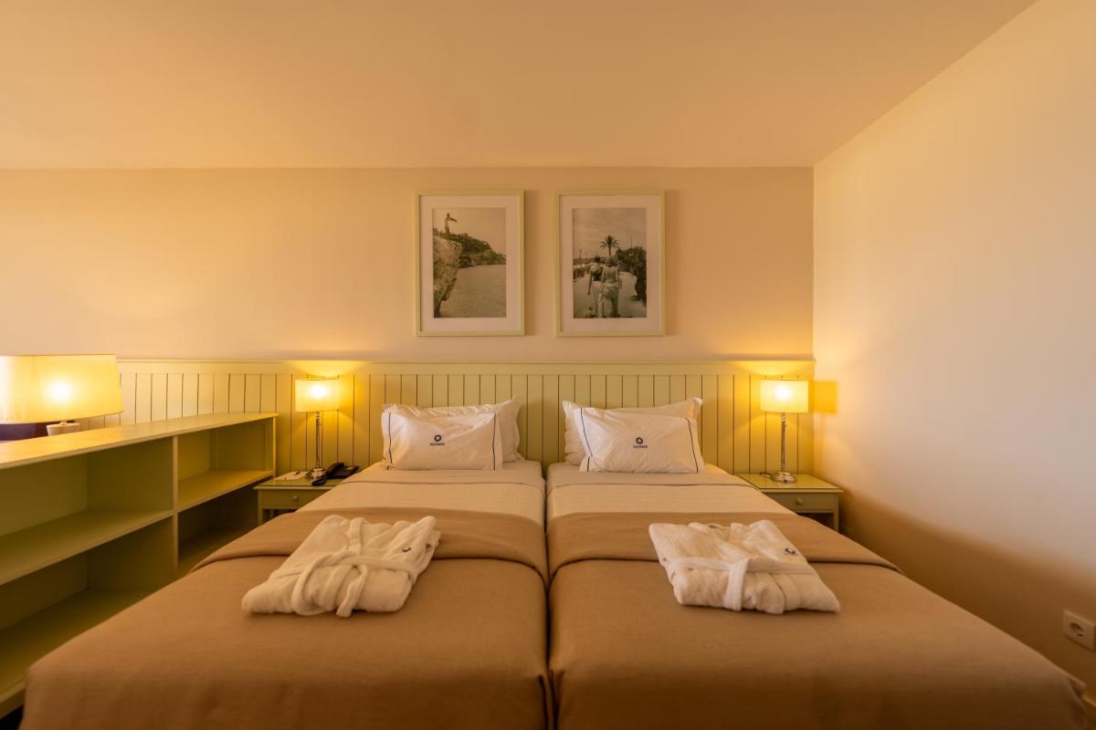 Uma cama ou camas num quarto em Algarve Casino Hotel