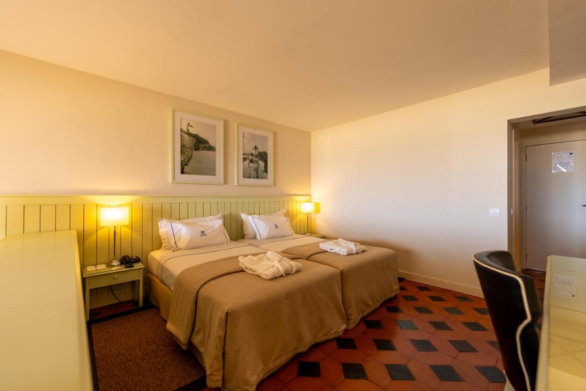 Uma cama ou camas num quarto em Algarve Casino Hotel