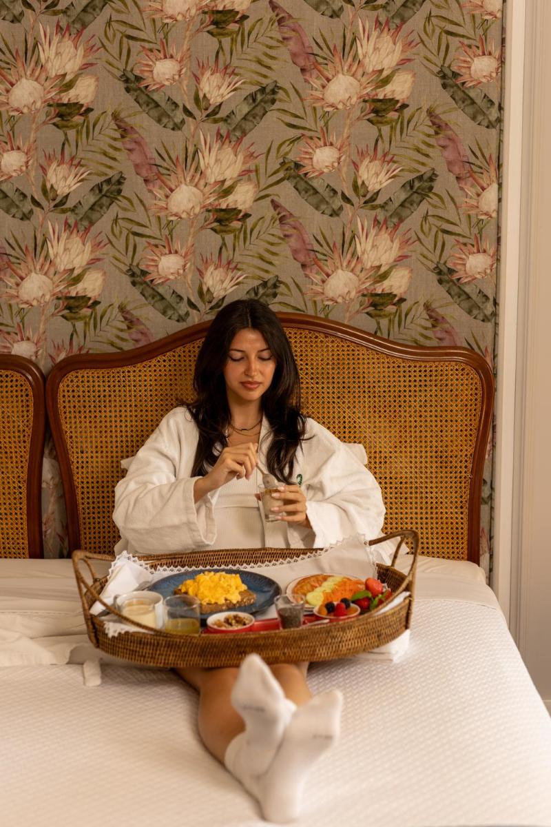 Uma cama ou camas num quarto em Hotel Solverde Spa and Wellness Center