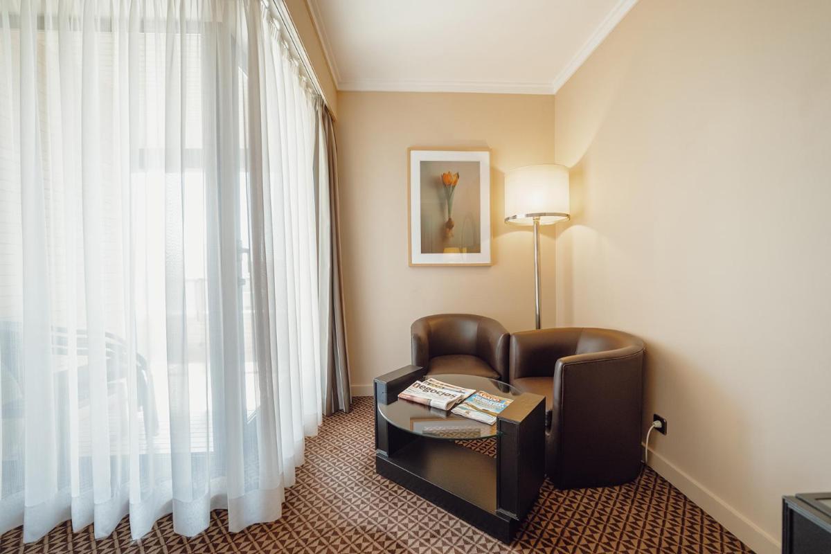 Uma área de estar em Hotel Solverde Spa and Wellness Center
