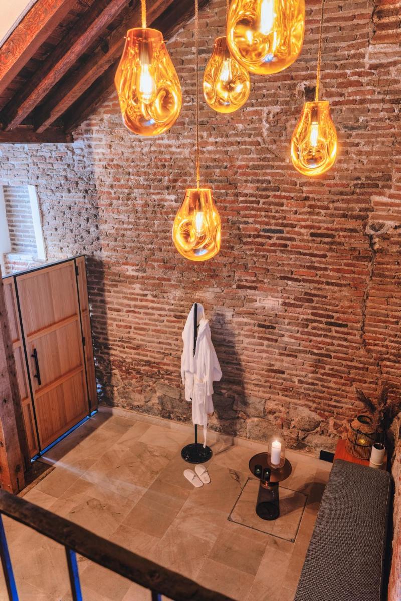 LOS MERCADERES Balneum Suites - Housity