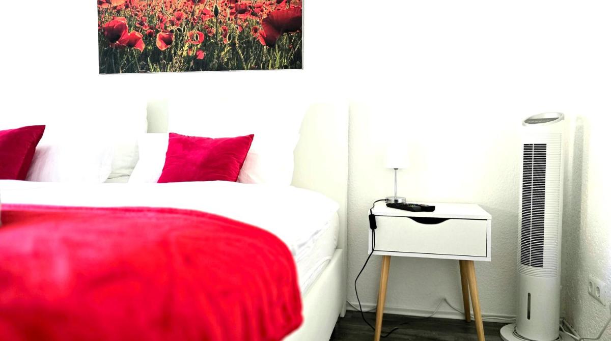 HAPPY HOMES RED - Dein stylisches Maisonette-Apartment mit Wow-Effekt! - Housity
