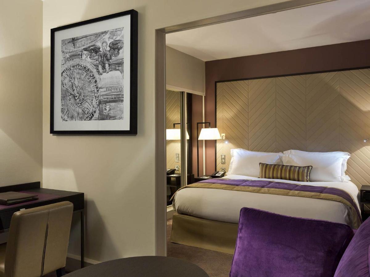 Un ou plusieurs lits dans un hébergement de l'établissement Sofitel Strasbourg Grande Ile