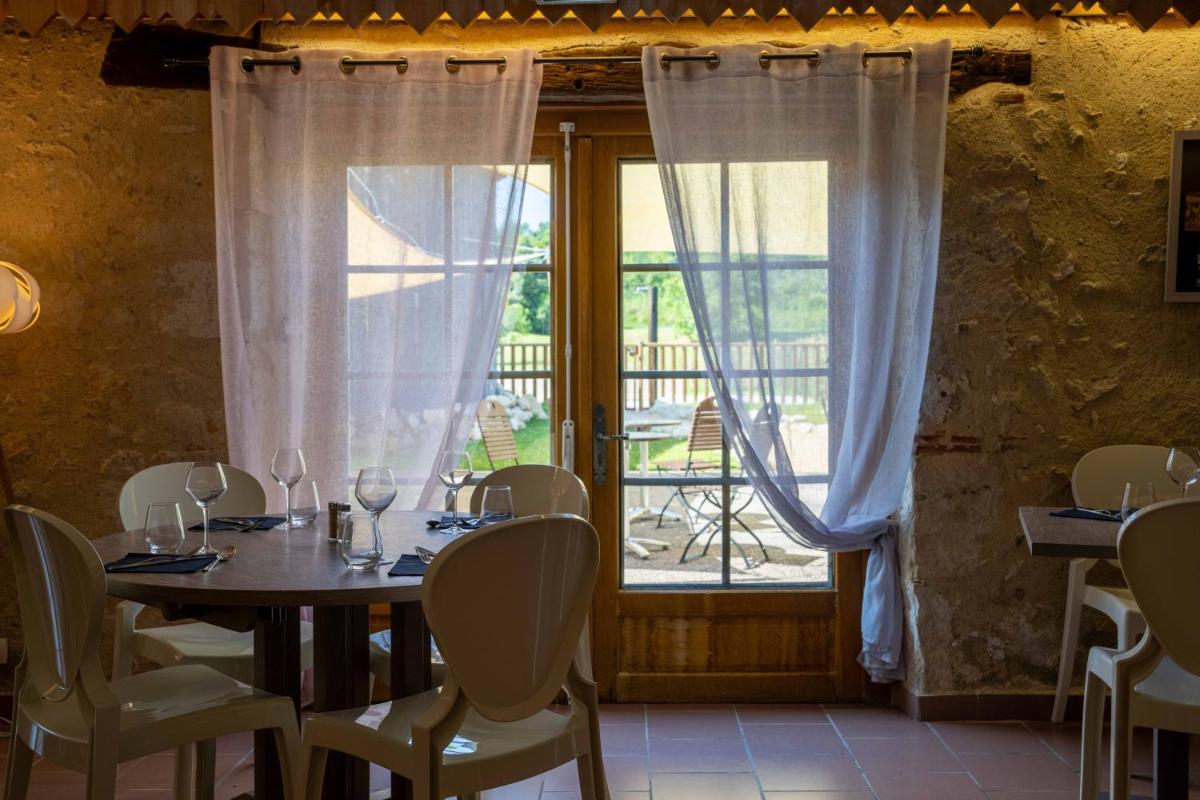Photo de la galerie de l'établissement Logis L'Auberge de Larressingle, à Larressingle