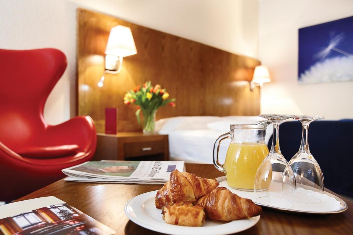 Golden Tulip Bielefeld City - Housity