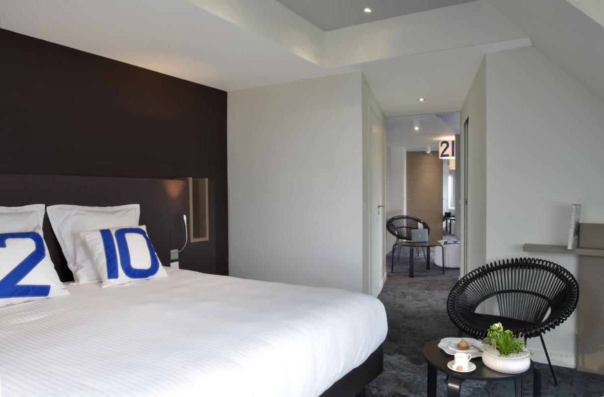 Un ou plusieurs lits dans un hébergement de l'établissement Hostellerie de la Pointe Saint-Mathieu - SPA & Restaurant