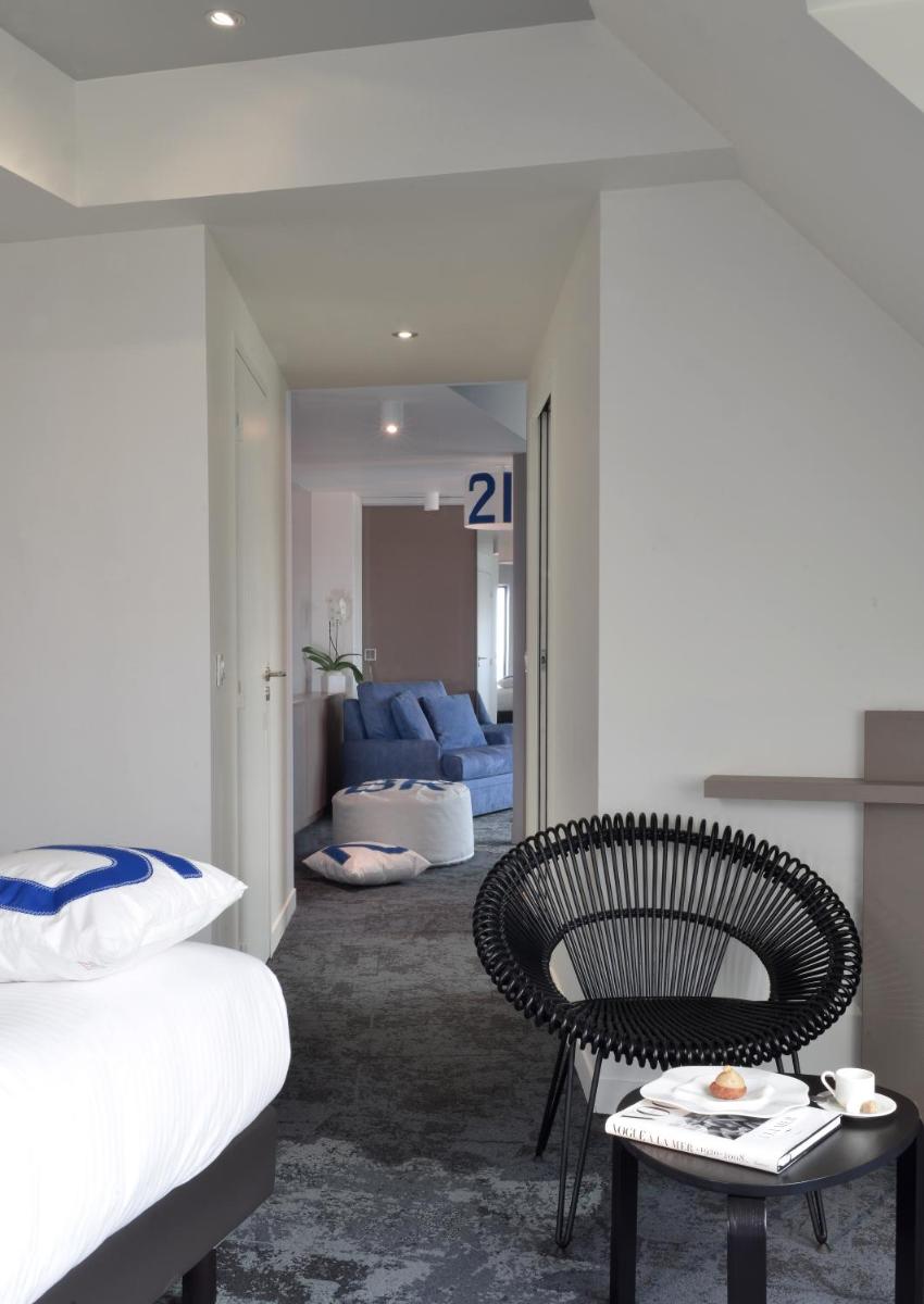 Un ou plusieurs lits dans un hébergement de l'établissement Hostellerie de la Pointe Saint-Mathieu - SPA & Restaurant