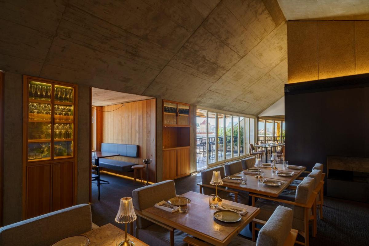 Uma área de estar em Lisboa Pessoa Hotel