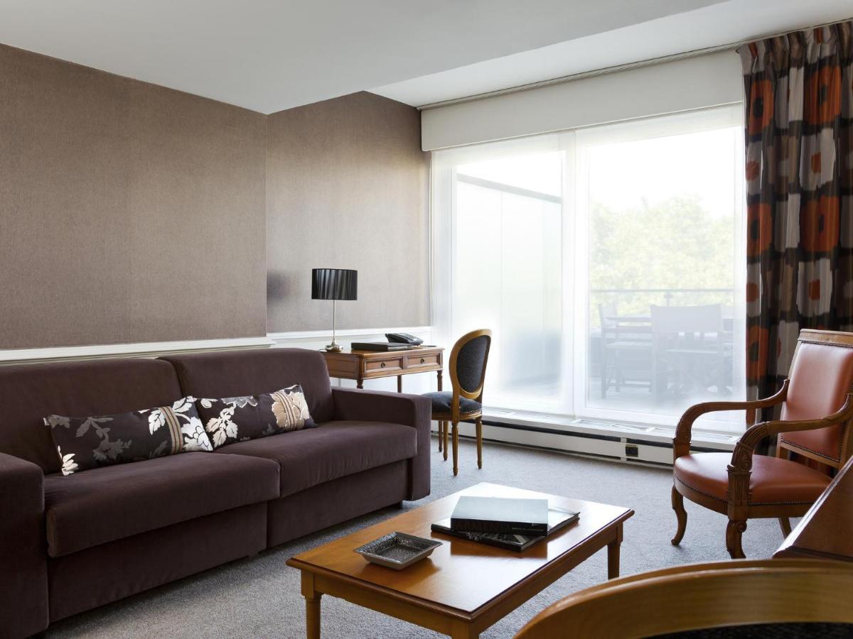 Coin salon dans l'établissement Sofitel Strasbourg Grande Ile