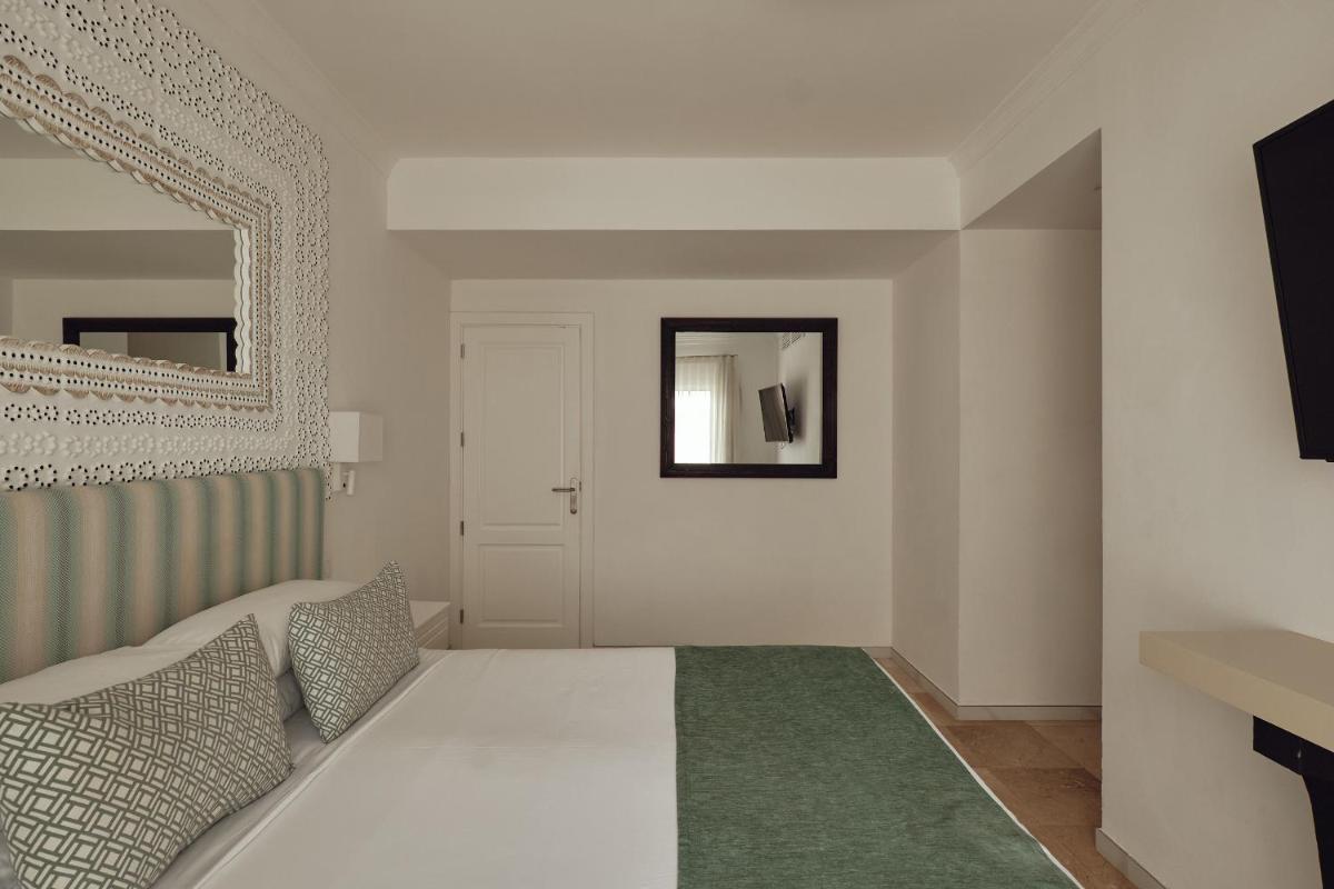Cama o camas de una habitación en Villas Alondra