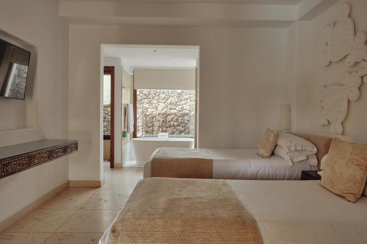 Cama o camas de una habitación en Villas Alondra