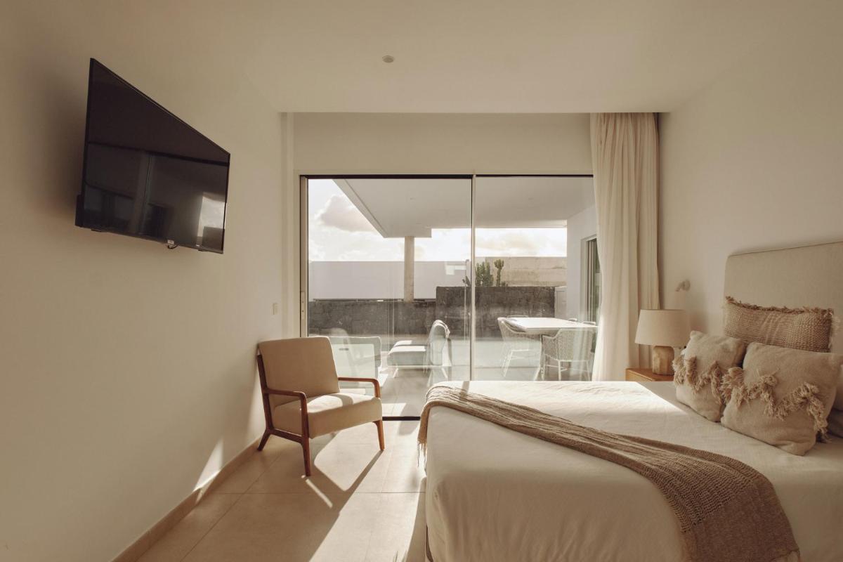 Cama o camas de una habitación en Villas Alondra