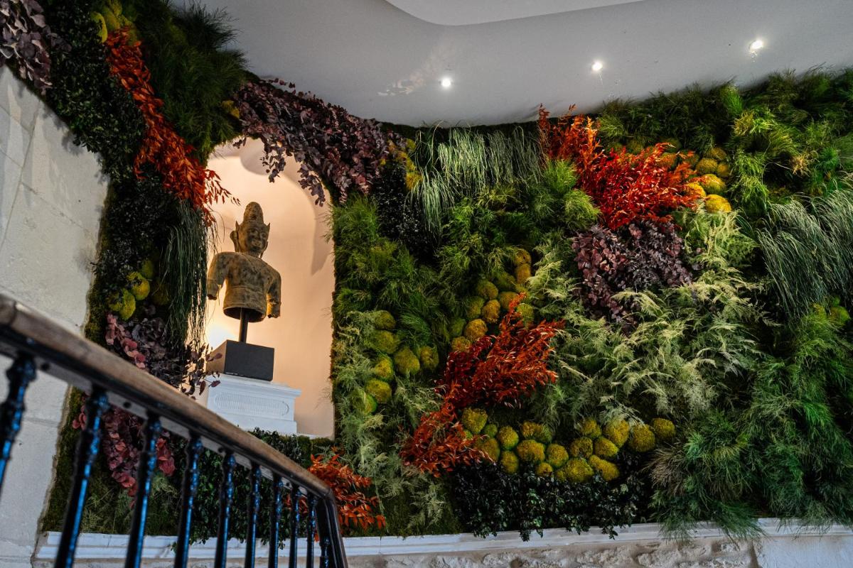 Jardin de l'établissement Hôtel Le Saint Remy & Spa