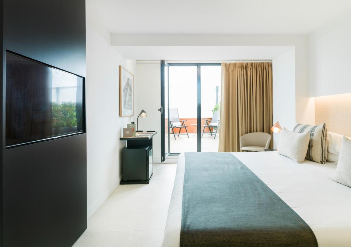 Cama o camas de una habitación en Nakar Hotel