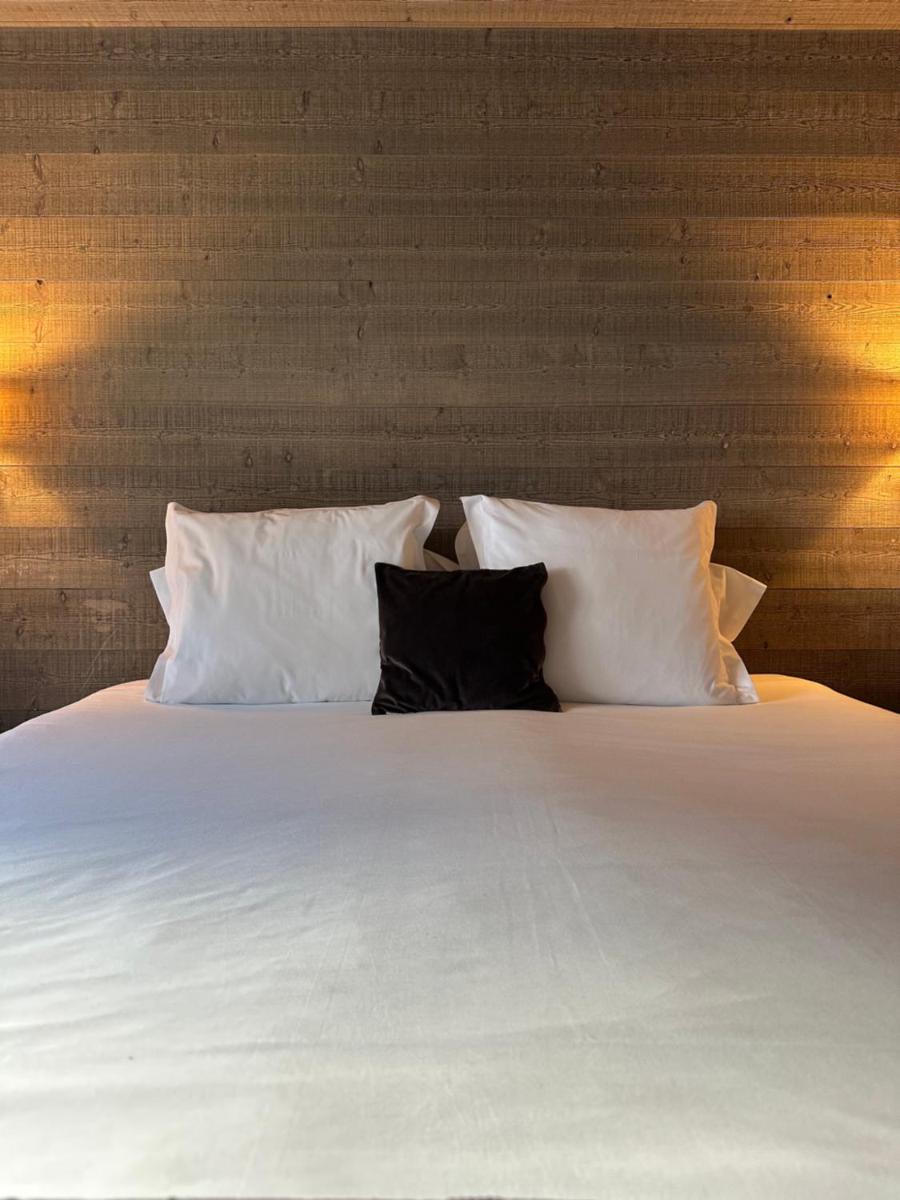 Un ou plusieurs lits dans un hébergement de l'établissement Victoria Lodge, Friendly Hotel