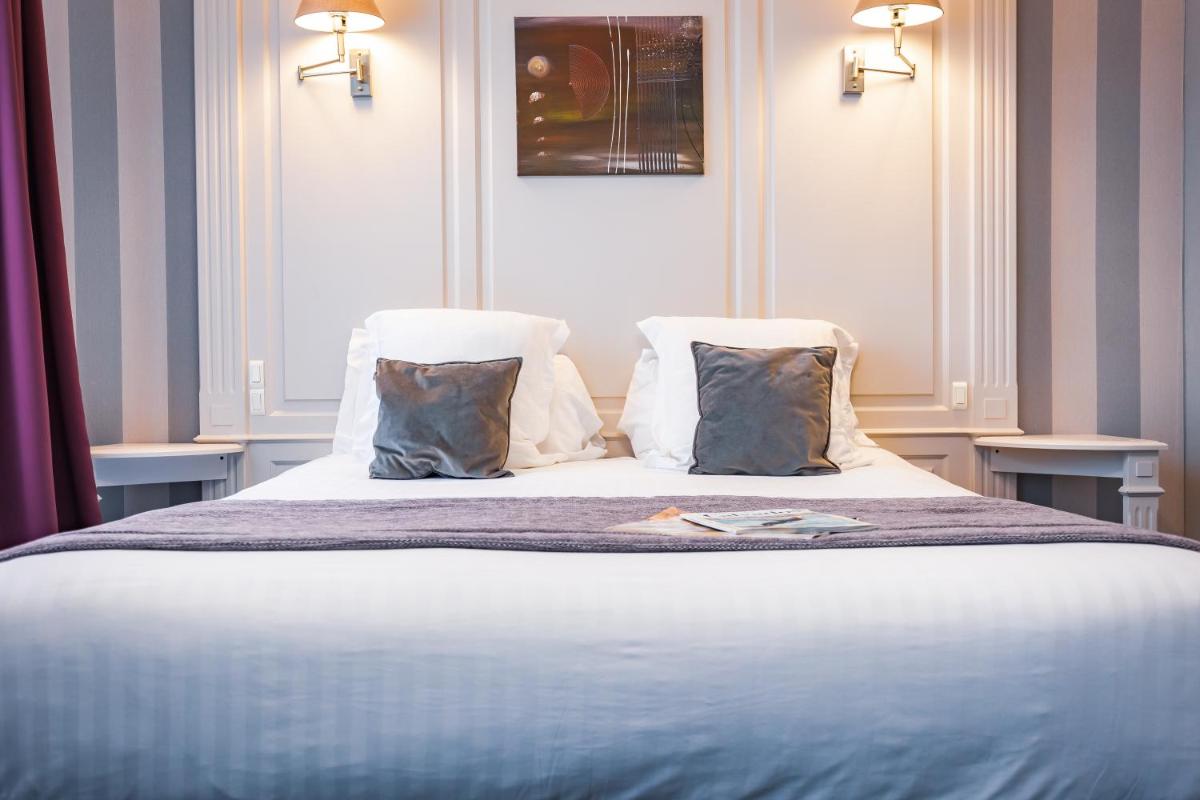 Un ou plusieurs lits dans un hébergement de l'établissement Grand Hôtel du Luxembourg & Spa