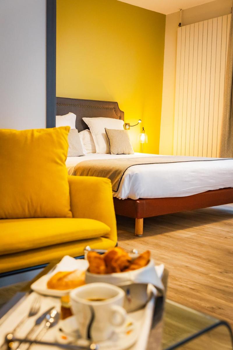 Un ou plusieurs lits dans un hébergement de l'établissement Grand Hôtel du Luxembourg & Spa