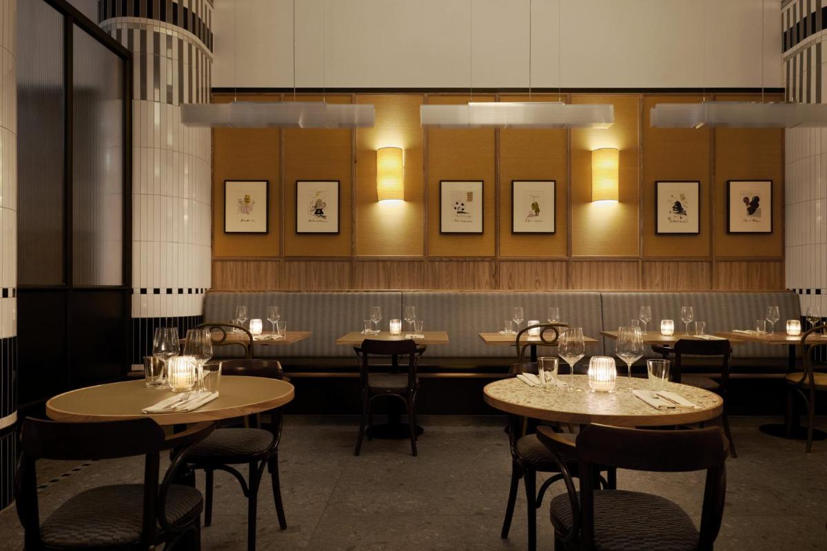 Ein Restaurant oder anderes Speiselokal in der Unterkunft Kimpton Main Frankfurt by IHG