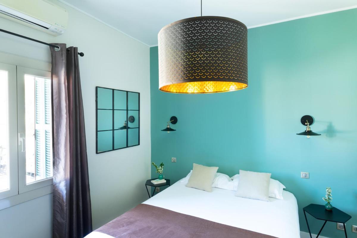 Un ou plusieurs lits dans un hébergement de l'établissement La Solenzara hôtel - 3 Etoiles Supérieur - Appartement & SPA
