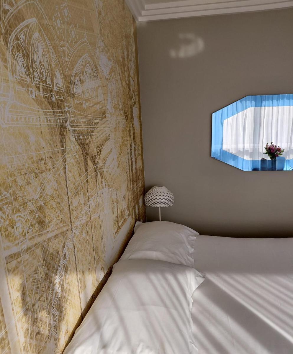 Un ou plusieurs lits dans un hébergement de l'établissement Célestins Spa Thermal & Hôtel by Vy Resort