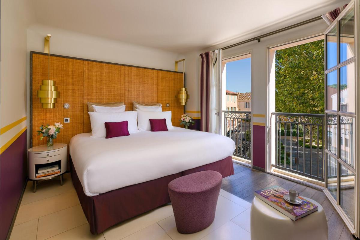 Un ou plusieurs lits dans un hébergement de l'établissement Hôtel de Paris Saint-Tropez
