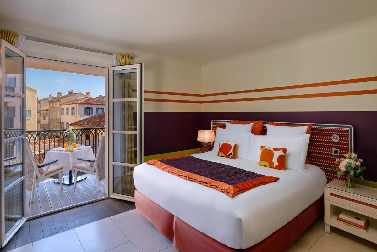 Un ou plusieurs lits dans un hébergement de l'établissement Hôtel de Paris Saint-Tropez