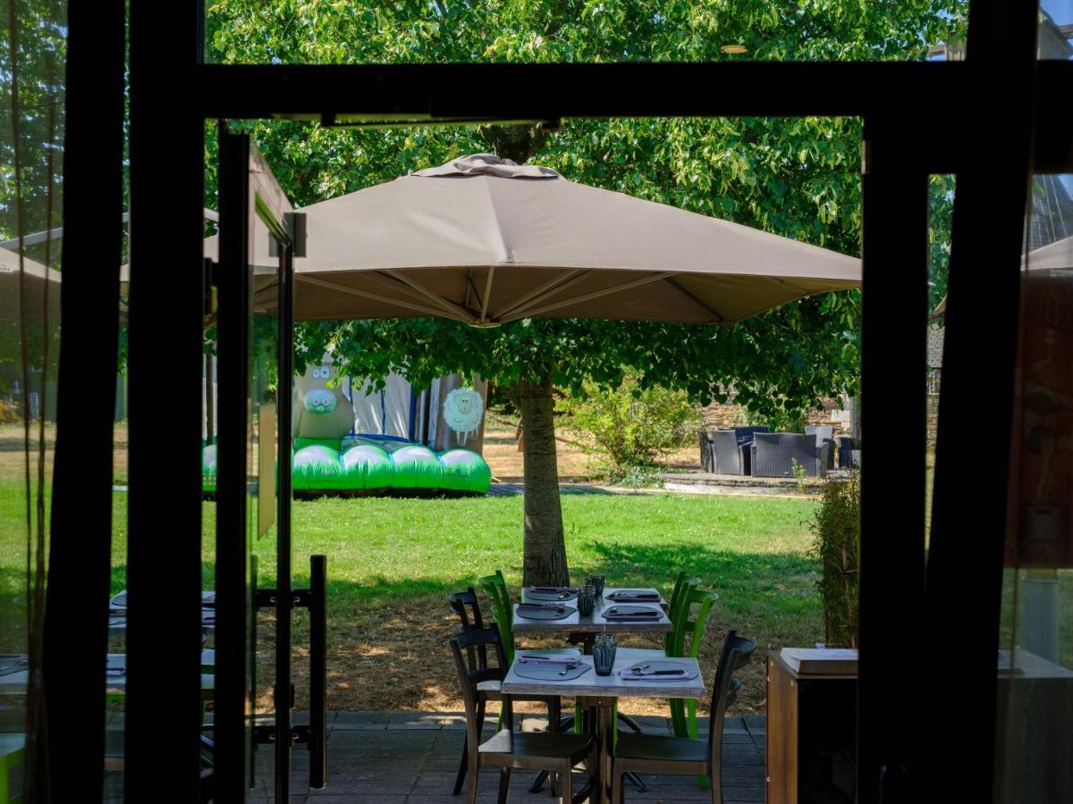 Jardin de l'établissement Logis Hôtel Domaine du Moulin Cavier - Restaurants & Spa