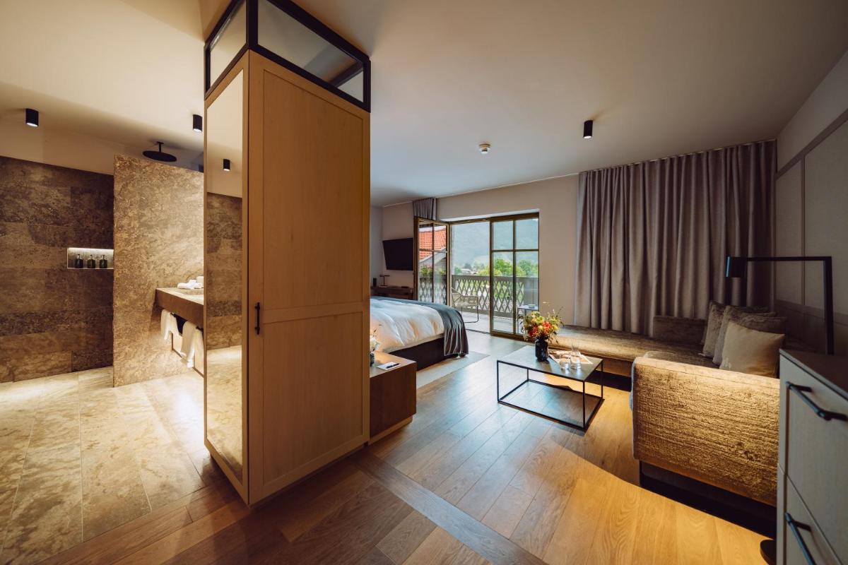 Ein Bett oder Betten in einem Zimmer der Unterkunft Parkhotel Egerner Höfe