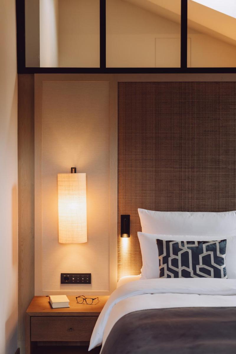 Ein Bett oder Betten in einem Zimmer der Unterkunft Parkhotel Egerner Höfe