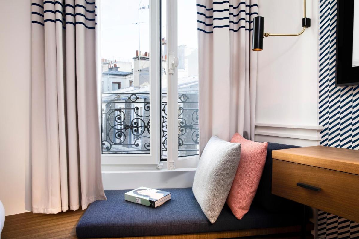 Coin salon dans l'établissement Maison ELLE Paris