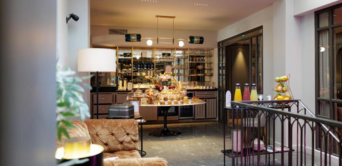 Coin salon dans l'établissement Maison ELLE Paris