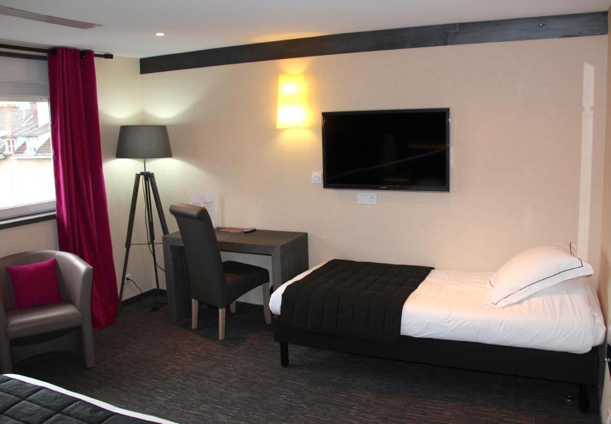 Un ou plusieurs lits dans un hébergement de l'établissement Hotel de la Jamagne & Spa