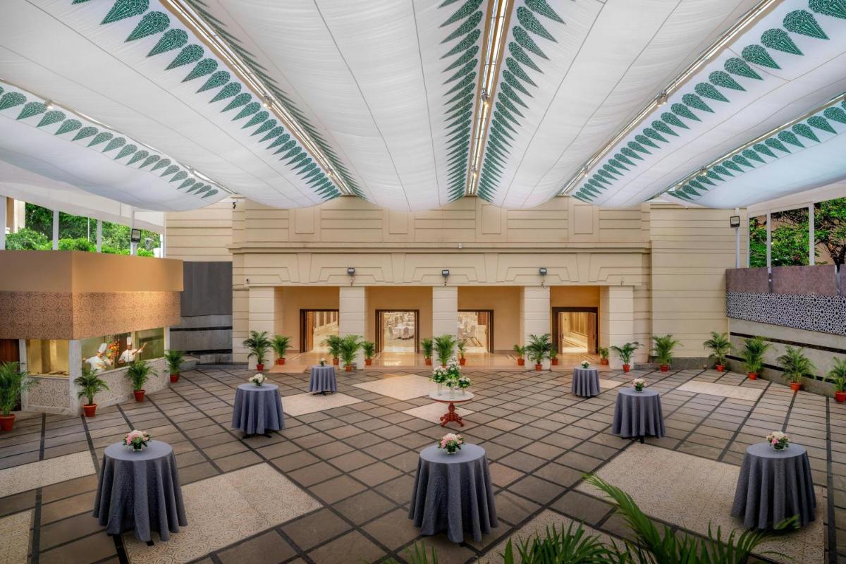 an image of a banquet hall with tables at ITC Kakatiya, a Luxury Collection Hotel, Hyderabad in Hyderabad