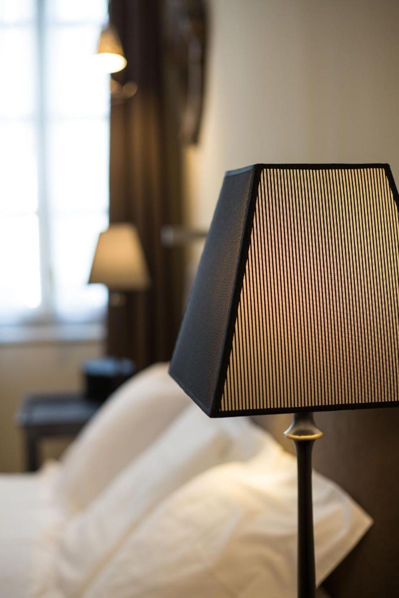 Un ou plusieurs lits dans un hébergement de l'établissement Hotel d'Europe