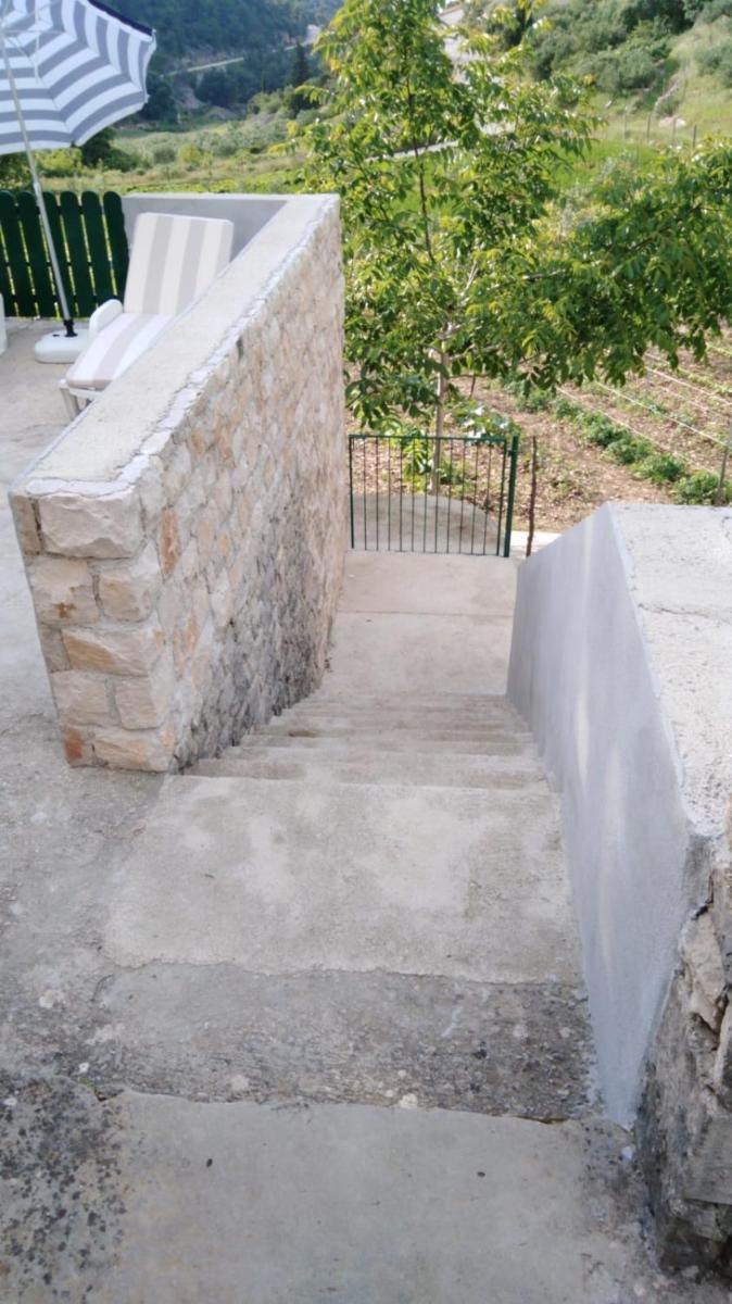 Secluded holiday house Postira, Brac - 17571 - Housity