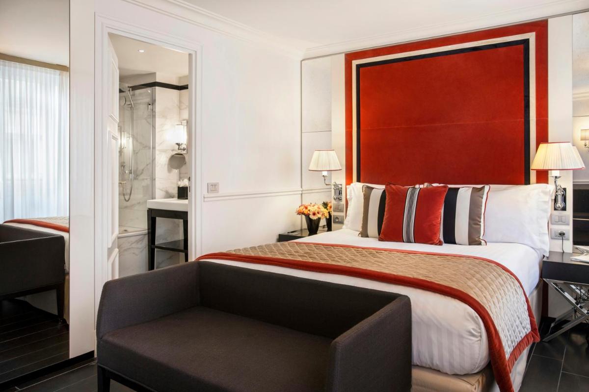 Un ou plusieurs lits dans un hébergement de l'établissement Castille Paris – Starhotels Collezione