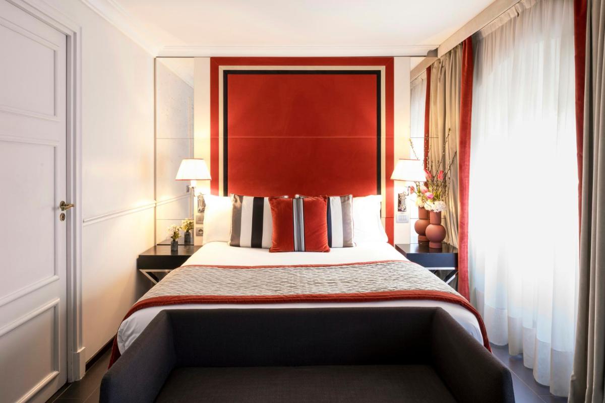 Un ou plusieurs lits dans un hébergement de l'établissement Castille Paris – Starhotels Collezione