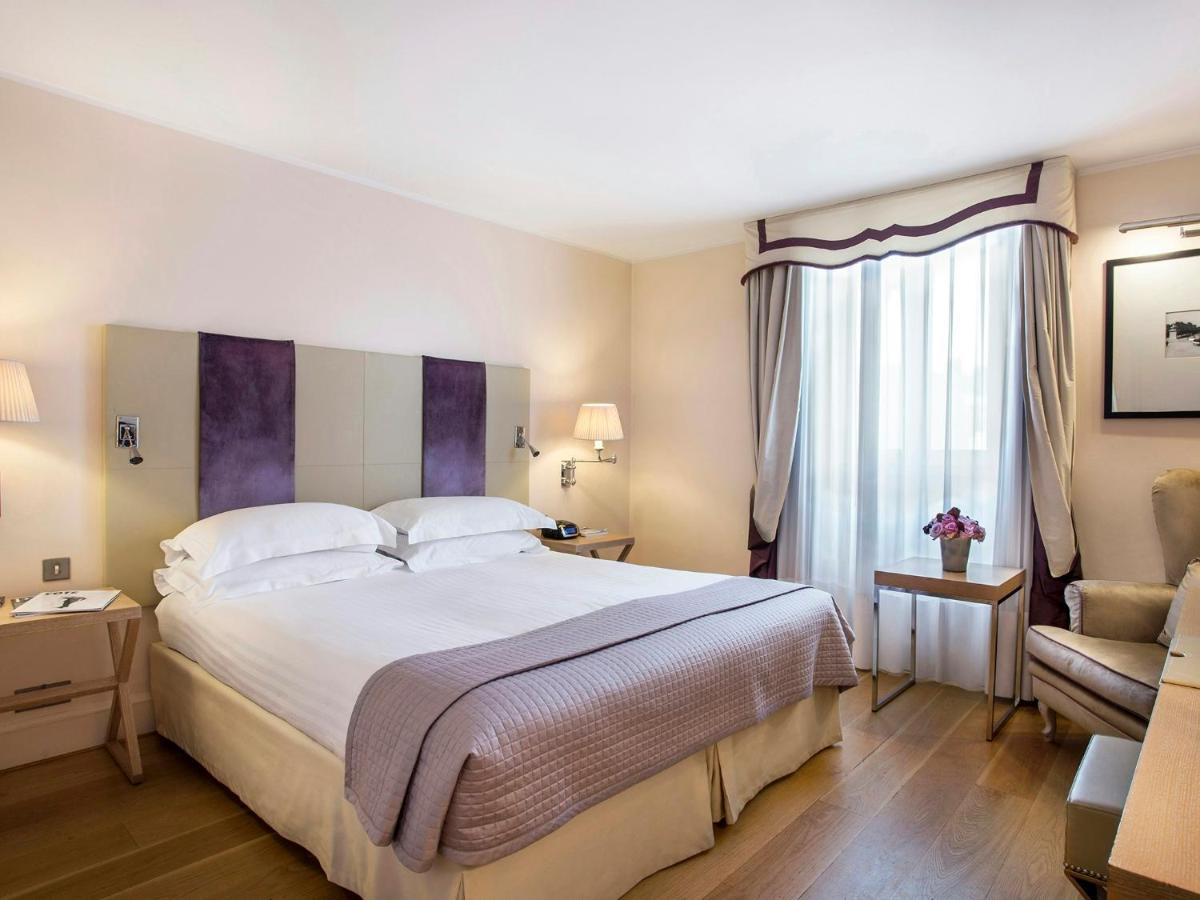 Un ou plusieurs lits dans un hébergement de l'établissement Castille Paris – Starhotels Collezione