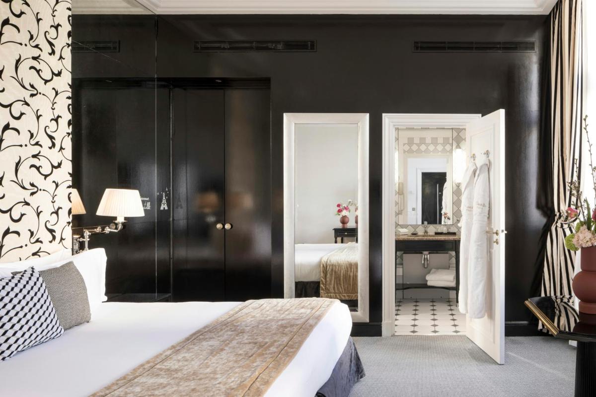 Un ou plusieurs lits dans un hébergement de l'établissement Castille Paris – Starhotels Collezione