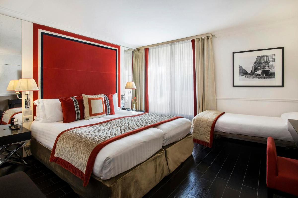 Un ou plusieurs lits dans un hébergement de l'établissement Castille Paris – Starhotels Collezione
