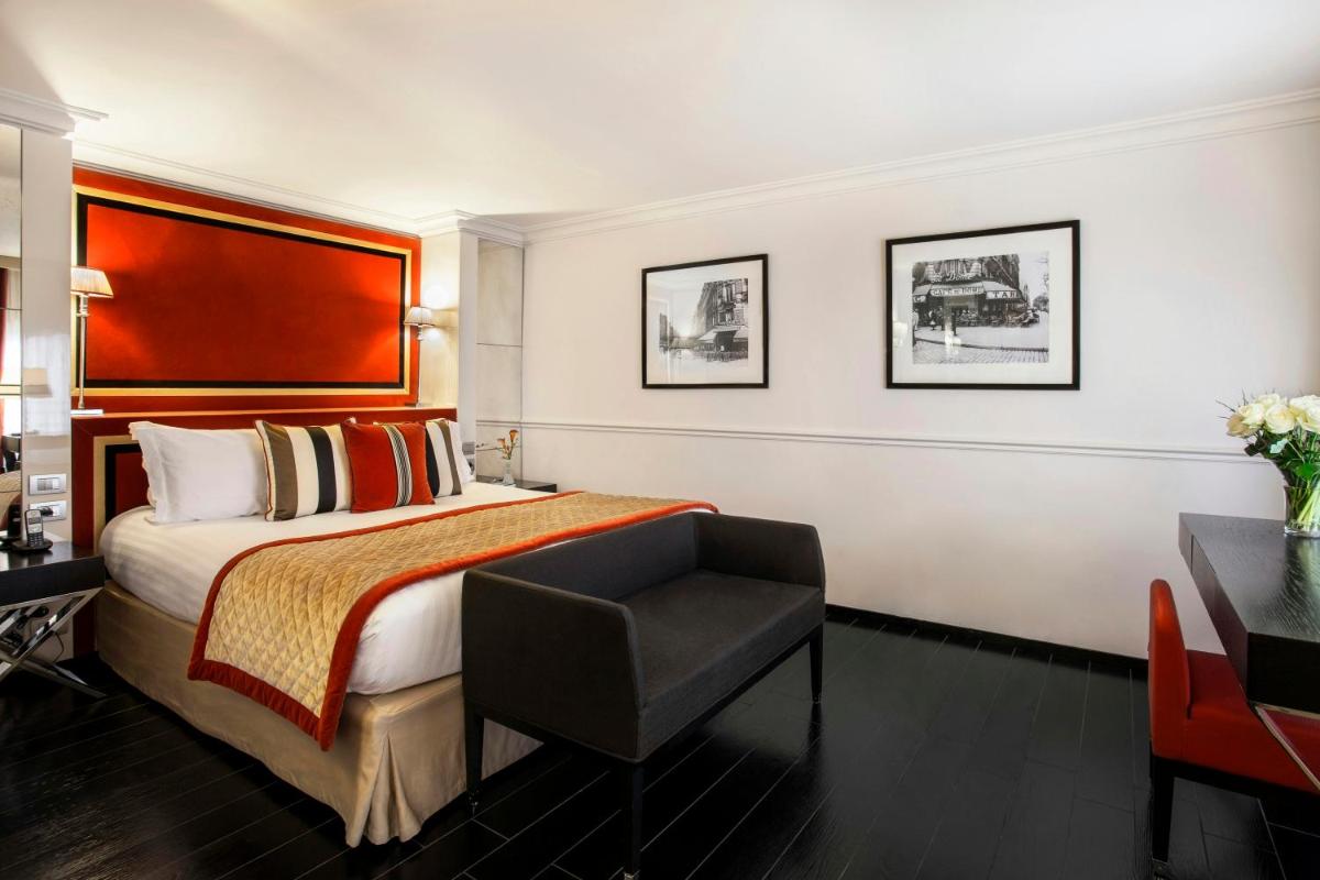 Un ou plusieurs lits dans un hébergement de l'établissement Castille Paris – Starhotels Collezione