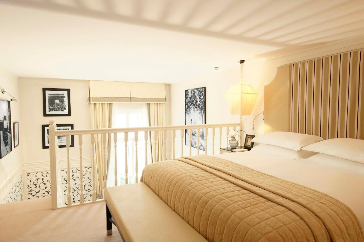 Un ou plusieurs lits dans un hébergement de l'établissement Castille Paris – Starhotels Collezione