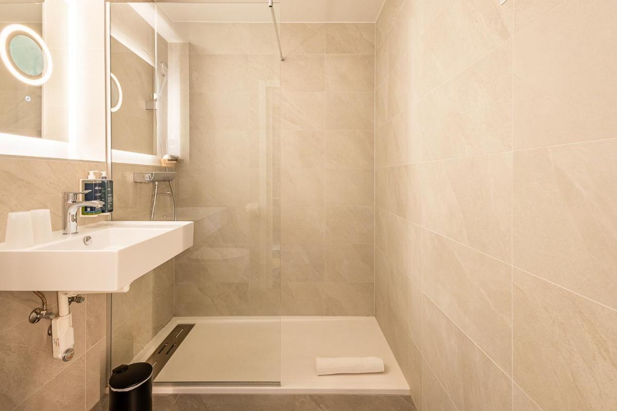 Salle de bains dans l'établissement Brit Hotel, Spa & Restaurant - Colmar Est