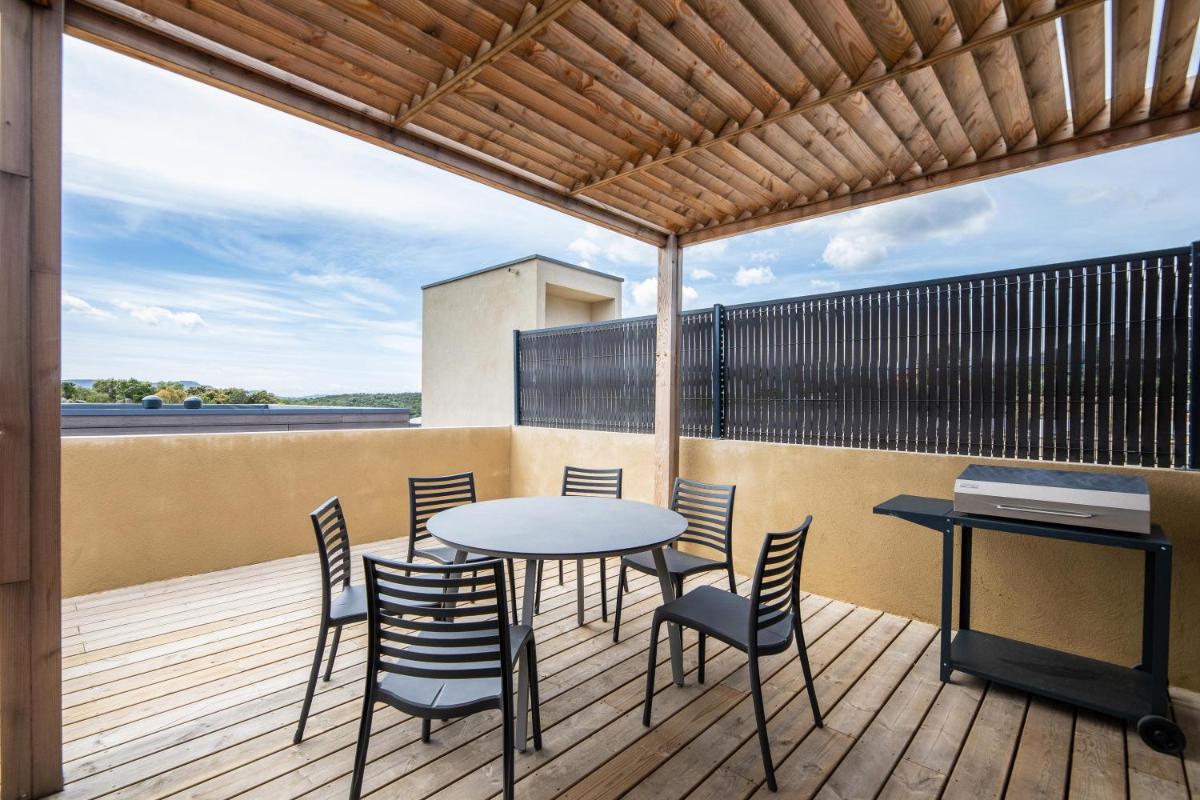 Balcon ou terrasse dans l'établissement Résidence Pierre & Vacances Premium Les Terrasses d'Arsella